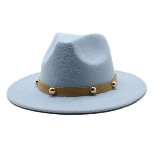 Detail of light blue fedora hat featuring a brown band with gold dome stud embellishments