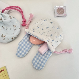 Floral drawstring pouches with cute bunny ears detail for cosmetics storage