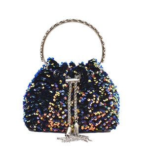 Chic blue sequined bucket bag with silver ring handle and rhinestone tassel chain