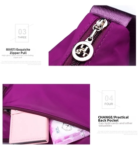 Detail of purple waterproof oxford bag showing zipper puller and back anti-theft pocket