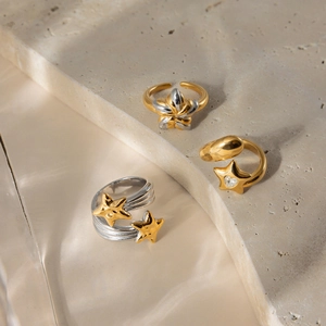 Three-piece stainless steel adjustable ring set with two-tone flower and star designs
