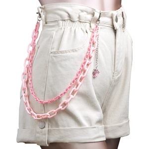 Detailed view of pink double-layered acrylic waist chain with heart gem pendant