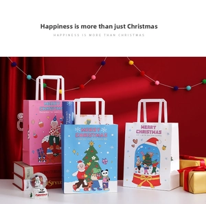 Three assorted Christmas gift bags in pink, blue and white with cartoon illustrations