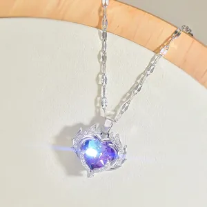 Titanium steel heart necklace with purple crystal and shimmering diamond halo