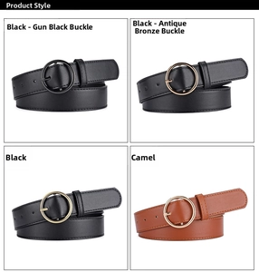 Detail view of round buckle PU leather belts in black and camel with metallic finishes