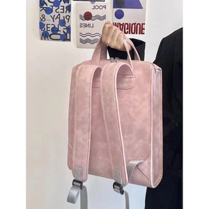 Pink PU leather laptop backpack back view showing adjustable straps and sturdy top handle