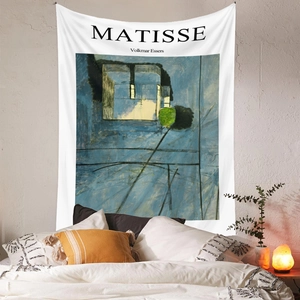 Detail view of Matisse abstract art tapestry hanging on a cozy bedroom wall