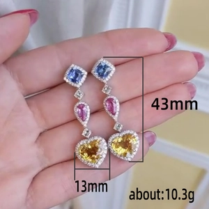 Colorful zircon drop earrings featuring blue square, pink pear and yellow heart gems