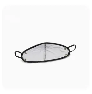 Detail view of winter respirator lining with four secure metal snap buttons for filters