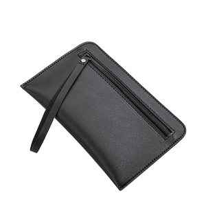 Minimalist black leather long clutch bag for women with wristlet strap and zipper closure
