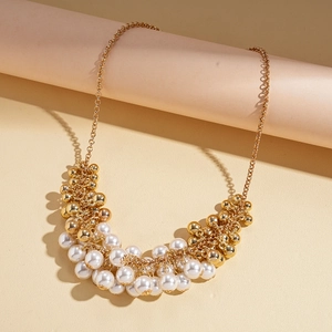 Baroque retro necklace with white faux pearls and golden metal beads on chain