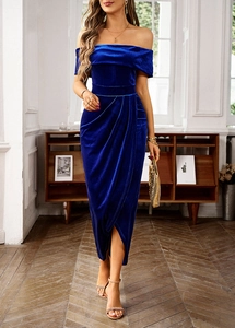 Detail of royal blue velvet off-shoulder dress with pleated waist and side slit