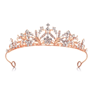 Detailed macro view of rose gold alloy wedding tiara with sparkling crystal flower patterns