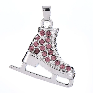 Close-up of silver ice skate charm with pink rhinestones for jewelry making