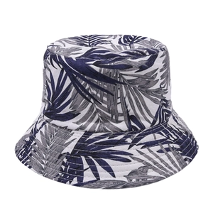 Cotton bucket hat with tropical palm leaf print in blue and grey for outdoor sun protection
