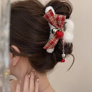 Christmas hair claw clip with red plaid bow, white plush pom-poms and bell tassels