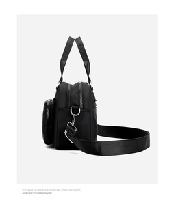 Detailed side view of black nylon handbag showing multi-layered zipper compartments
