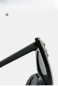 Detail of cat eye sunglasses with rhinestone chains and flexible lightweight temples