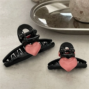 Pink heart mini hair claw clips in black plastic, set of two hair accessories for styling