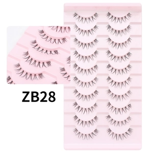 Detail view of ZB28 natural criss-cross false eyelashes on a pink tray, 10 pairs set