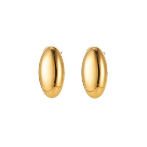 Macro view of minimalist golden oval stud earrings with a smooth mirror finish