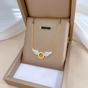 Titanium steel gold necklace with sparkling crystal angel wing pendant in a gift box