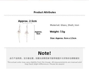 Detail view of flower tassel earrings with glass beads and shell petals dimensions