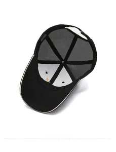 Detail view of the black mesh baseball cap showing interior 100% cotton lining and strap