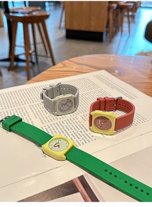 Three colorful fashion quartz watches with octagonal cases and soft silicone straps