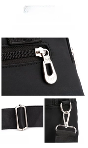 Detail of durable nylon handbag with silver metal zippers and reinforced stitching
