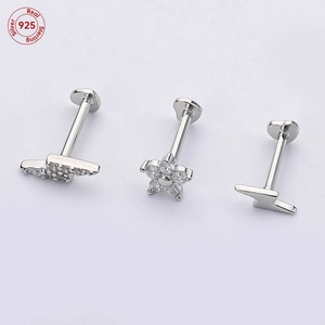 Set of 925 sterling silver cartilage earrings featuring heart, flower, and lightning shapes