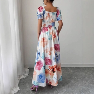 Floral puff sleeve high waist maxi dress featuring a colorful print and white fabric
