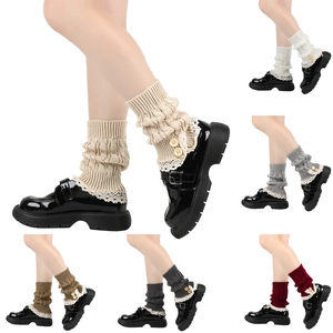 Knit leg warmers with lace trim and wooden buttons available in six assorted colors