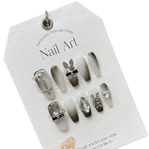 Handmade black ombre press-on nails with silver 3D rabbit and gothic metal charms
