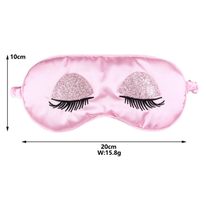 Pink silk eye mask with eyelash embroidery showing dimensions 20cm x 10cm and 15.8g weight