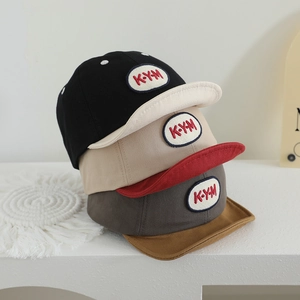 Toddler KYM letter patch soft brim baseball caps in black, beige, and grey color options