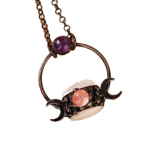 Vintage bronze moon pendant necklace featuring amethyst and rose quartz druzy accents