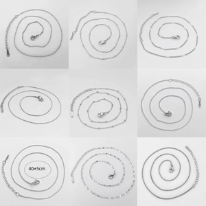 Set of 9 assorted silver stainless steel necklaces including snake and bead chains 40+5cm