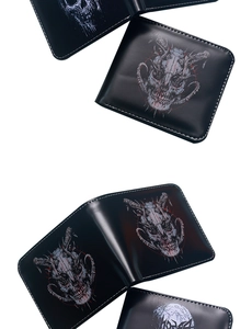 Detailed view of men's skull pattern wallets with contrast stitching and leather texture