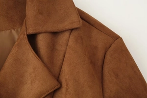 Detailed macro view of the lapel and stitching on this camel suede jacket for women