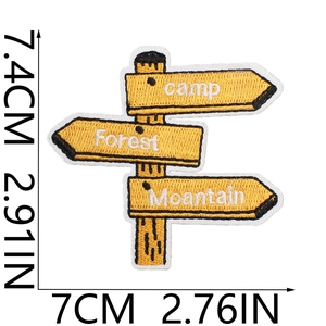 Close-up of embroidered camping patch showing detailed needlework and 7.4x7cm size