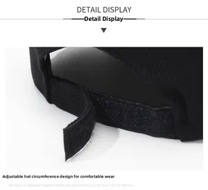 Detail view of the adjustable velcro back strap on this black cotton baseball cap