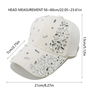 Detail view of white velvet baseball cap with sparkling rhinestones and waffled texture