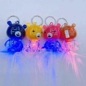 Mini LED flashlight bear keychains in blue, yellow, pink, and orange plastic colors