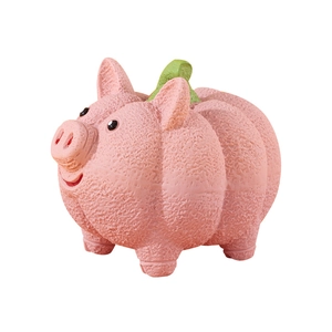 Pink pig pumpkin latex dog toy with textured surface for chewing and playing