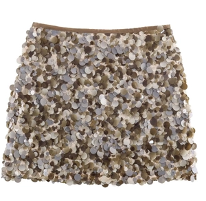 Detail of high-density earth-tone sequins on an A-line mini skirt with elastic waist