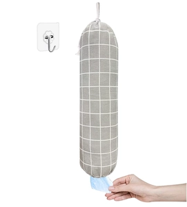 Gray checkered fabric wall-mounted grocery bag dispenser with bottom opening for easy access