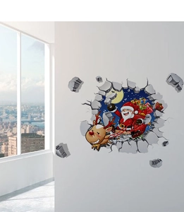 Detailed 3D Christmas wall decal of Santa and reindeer flying through a broken wall effect