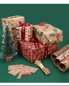 Christmas gift wrapping set with snowflake patterns, red ribbons, tags and twine