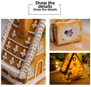 Close-up of LED gingerbread house detail showing textured surface and battery compartment